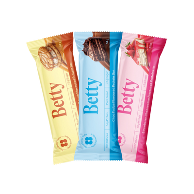 A 3 pack of 1 bar of each Caramel Cookie Dough, Choc Fudge, and Strawberry Cheesecake Bars by Good Betty. 