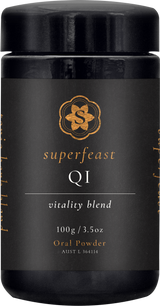 A supplement container of QI Blend by SuperFeast