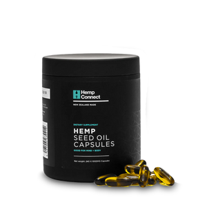 A Supplement container with the name Hemp Seed Oil Capsules y Hemp Commect.